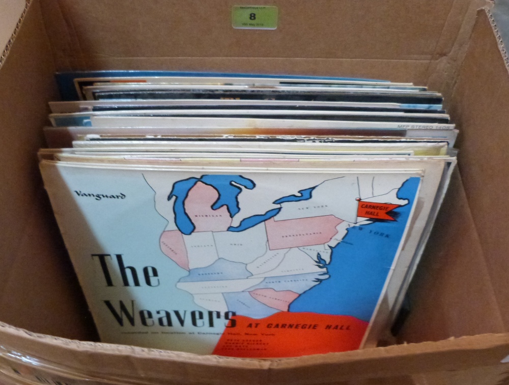 A box of vinyl records