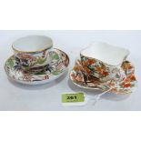 A Coalport quatrefoil form teacup and saucer in imari palette and a 19th century teacup and saucer