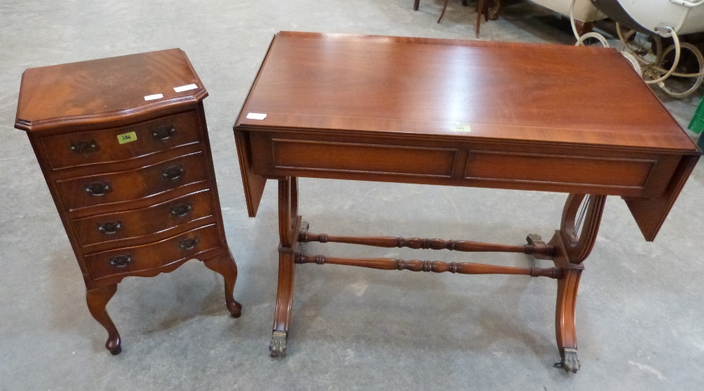 A small serpentine chest of four drawers and a sofa table. Both of recent manufacture