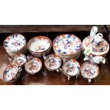 A Victorian part tea service of 37 pieces decorated in chinoiserie style. Red crown mark