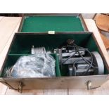 A vintage cased school projecter microscope