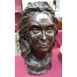 A bronze bust of a lady. Dark brown patination. Apparently unsigned. 18' high