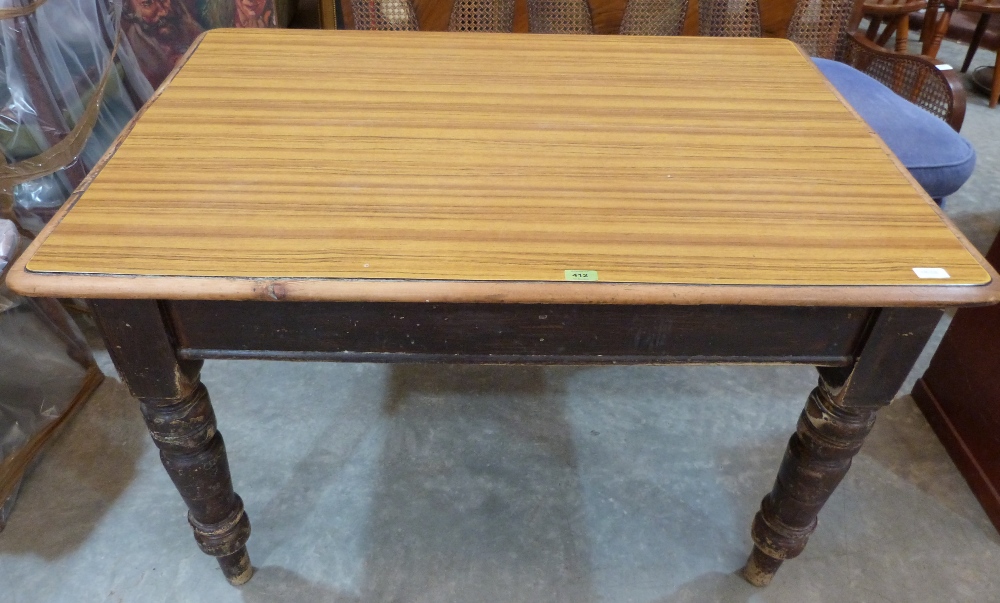 A Victorian painted pine kitchen table with frieze drawer. Formica cover to top. 48' long