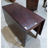 A George III mahogany gateleg table on chamfered square legs. 43' wide