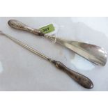 A silver handled buttonhook and shoe horn. Birmingham 1912