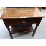 A mahogany side table with frieze drawer on ring turned legs. 29' wide