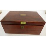 A 19th century mahogany writing slope with fitted locking drawer, the lid with engraved brass