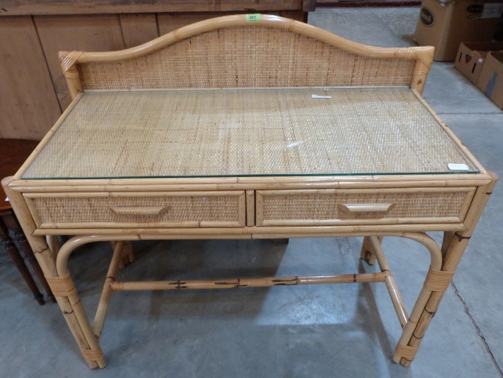 A bamboo dressing table with two frieze drawers. 39' wide