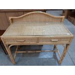 A bamboo dressing table with two frieze drawers. 39' wide