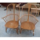 A pair of Ercol 'Craftsman' Windsor elbow chairs