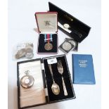 A silver half-hunting keyless watch, a cased silver christening spoon and fork, 1944 Normandy