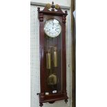 A Vienna style clock of recent manufacture, the two train movement with compensated pendulum. 41'