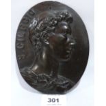 A bronze plaque, cast in relief with a classical male bust in profile, signed S. Giorgio. 6½' high
