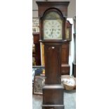 An early 19th century oak 8 day longcase clock, the breakarch dial signed Wm. Whitmore Northampton