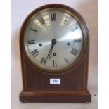 An English mahogany and line inlaid bracket clock with silvered dial, the three train brass movement