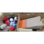 A box of TY teddy bears and a box of games