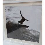 A framed photographic print of a surfer 23' x 23'