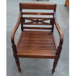 A hardwood Regency style elbow chair