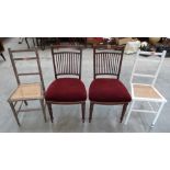 A pair of mahogany dining chairs and pair of side chairs with caned seats