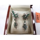 A pair of Art-Deco design bagette diamond and emerald earrings, the drops removeable to wear as a