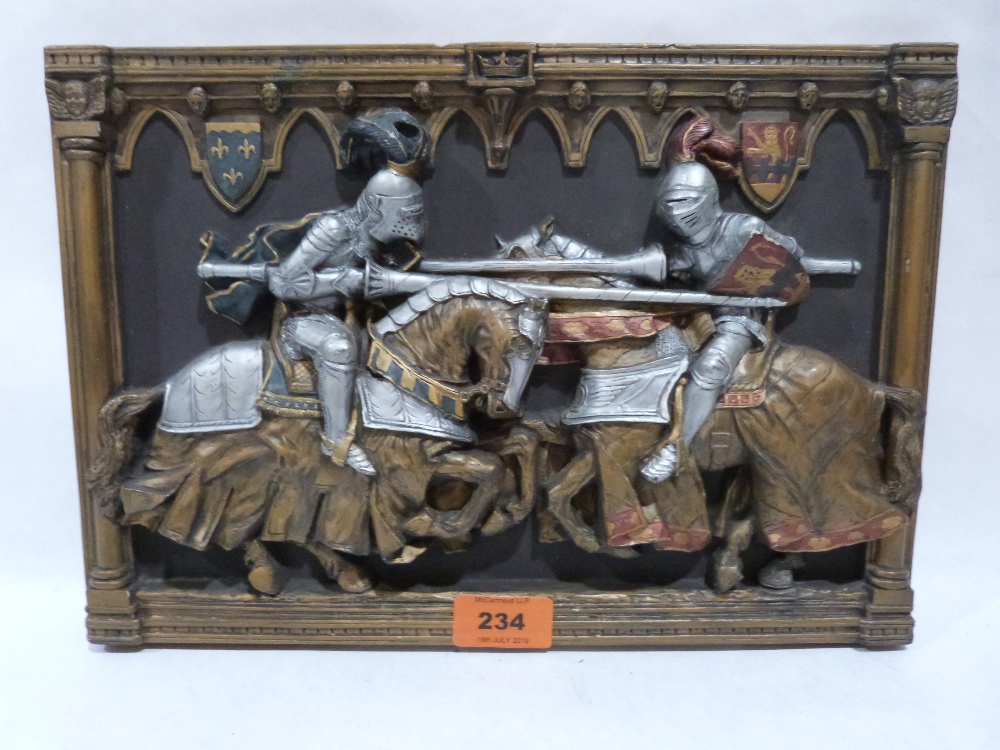 A painted plaster jousting plaque in high relief. 9' x 12½'