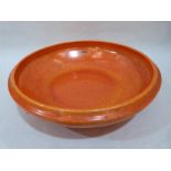 A Royal Lancastrian Pottery orange flambé glazed bowl. Impressing mark and no. 3239 to base. 12½'