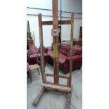A pine artist's studio easel. 83' high