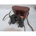 A cased pair of Zeiss Jenoptem 10x50 binoculars