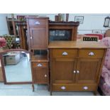 A Spanish bedroom cabinet with two drawers 41' wide; with a pair of matching bedside cabinets and