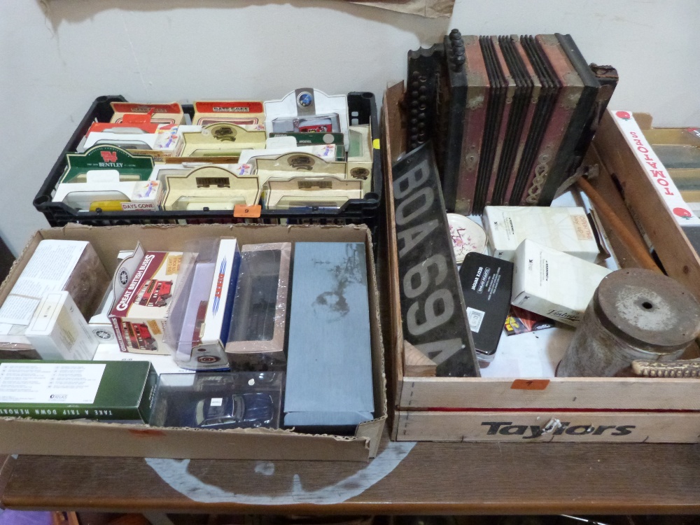 Two boxes of boxed diecast model vehicles and a box of sundries