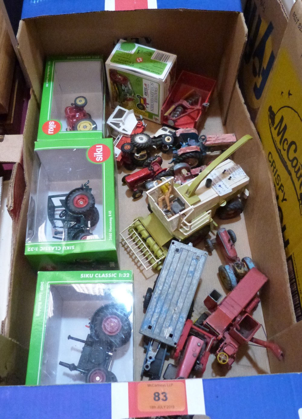 A collection of diecast Tractors, Britains, Corgi etc.