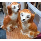 A pair of Staffordshire style figures of dogs. 13¼' high