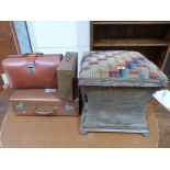 Three cases and a Victorian ottoman (A.F.)