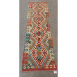 A Choli Kelim carpet runner. 2.15m x 0.66m