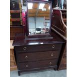 A Stag chest of drawers and dressing table mirror