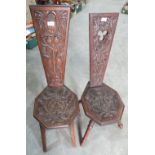 Two Welsh oak spinning chairs, each carved with thistles to the backs and seats