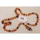 A necklace of amber pebble beads. 21.5g gross