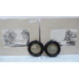 A pair of Georgian needlework picture miniatures, the ebonised frames 4¼' diam (one with losses)