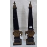 A pair of cobalt blue ceramic and gilt metal obelisks. Of recent manufacture. 26' high