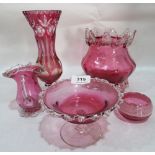 Five items of cranberry and ruby glass