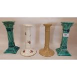 A pair of Wardle turquiose, glazed corinthian candlesticks 8½' high and two other ceramic examples