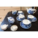 A collection of blue and white and other doll's teaware