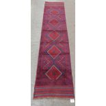 A Meshwani carpet runner. 2.66m x 0.61m