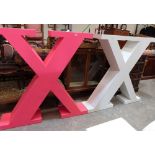 Two painted wood 'X' shop fitting letters. 59' high