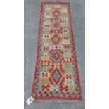 A wool vegetable dyed Choli Kelim runner. 200cm x 60cm