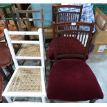 A pair of mahogany dining chairs and a pair of side chairs with caned seats