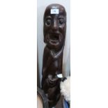 An ethnic carved hardwood figure. 24' high