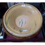 Two glazed earthenware dairy bowls