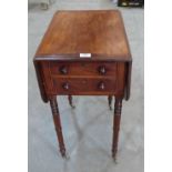 A George IV mahogany and rosewood crossbanded dropleaf side table with two drawers on ring turned