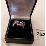 A tanzanite and diamond cocktail ring. In gold marked 375. 3.2g gross. Size Q